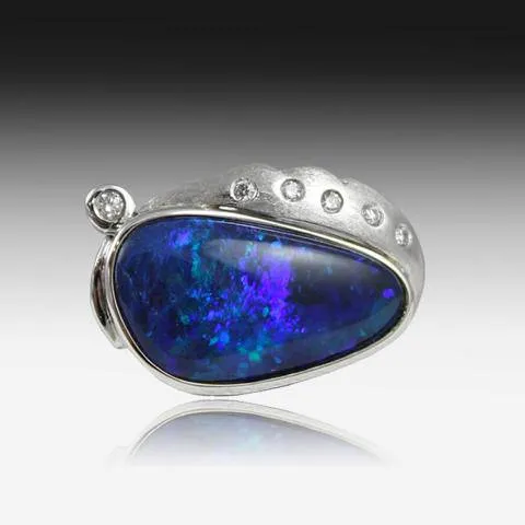 18KT WHITE GOLD BLACK OPAL AND DIAMOND RING