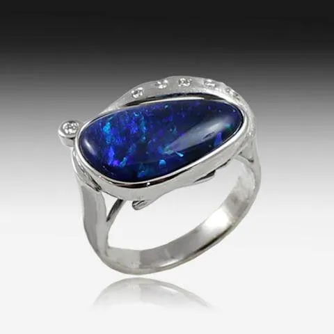 18KT WHITE GOLD BLACK OPAL AND DIAMOND RING