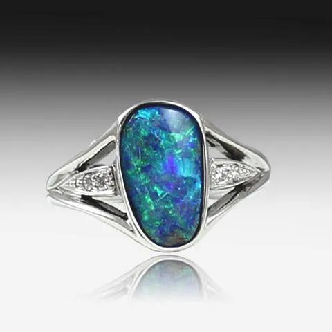 18KT WHITE GOLD BOULDER OPAL AND DIAMOND RING