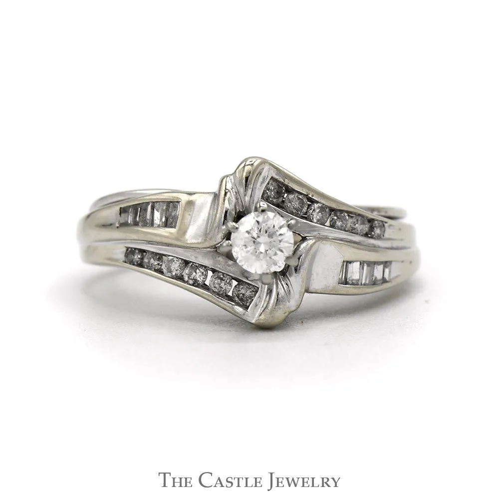 Bypass Design Engagement Ring With .20CT Round Brilliant Cut Center And .30CTTW Of Channel-Set Baguette Cut And Round Diamond Sides In 14KT White Gold