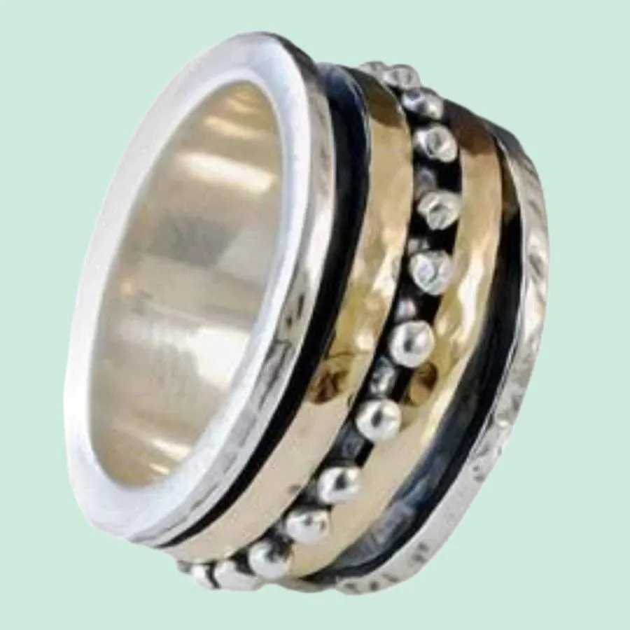 Sterling Silver & Gold 9KT Spinner ring for woman.  Boho chic Meditation ring.